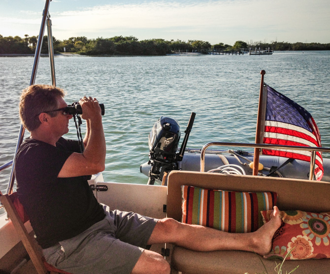 Captain Jim with Binoculars, New Pass, Florida
