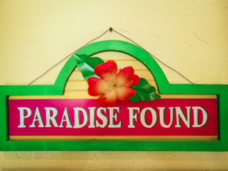 Paradise Found sign